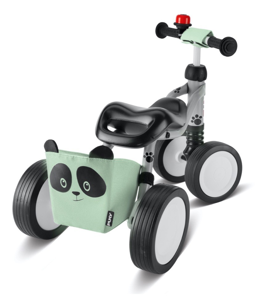 Der "Wutsch Panda" von Puky hat einen süßen Korb mit Pandamotiv, in dem auch die Spielzeuge unterwegs ihren Platz finden.